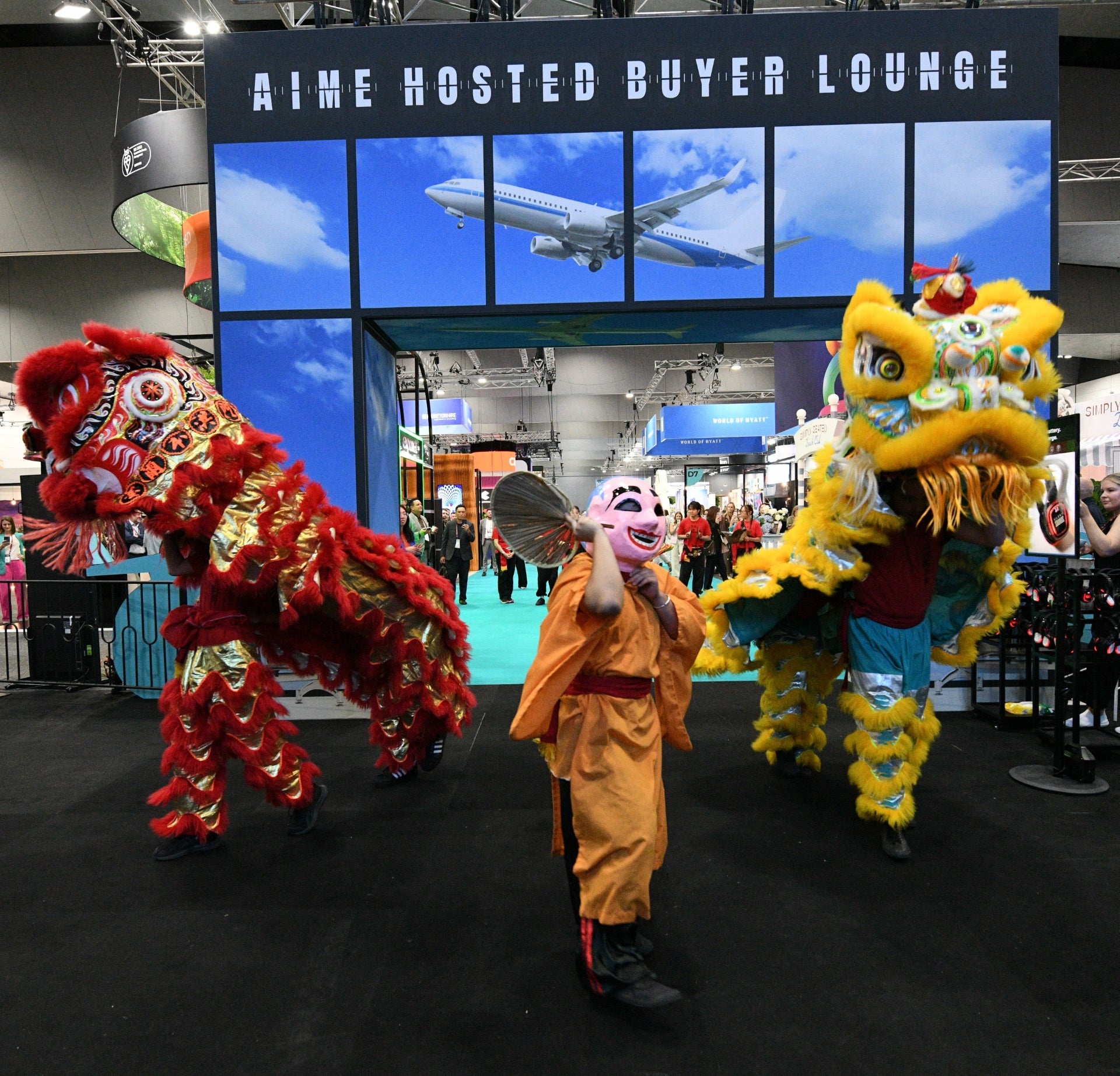 Lion dance cultural performance at the entrance of the AIME 2026 Hosted Buyer Lounge at Melbourne Convention Centre
