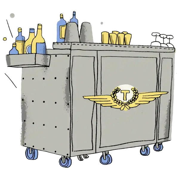 Gray metal bar cart with blue wheels and a gold winged ’t’ emblem on the front.