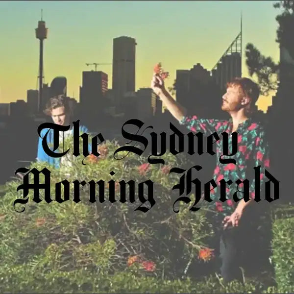 The sydney morning herald logo in black gothic script.