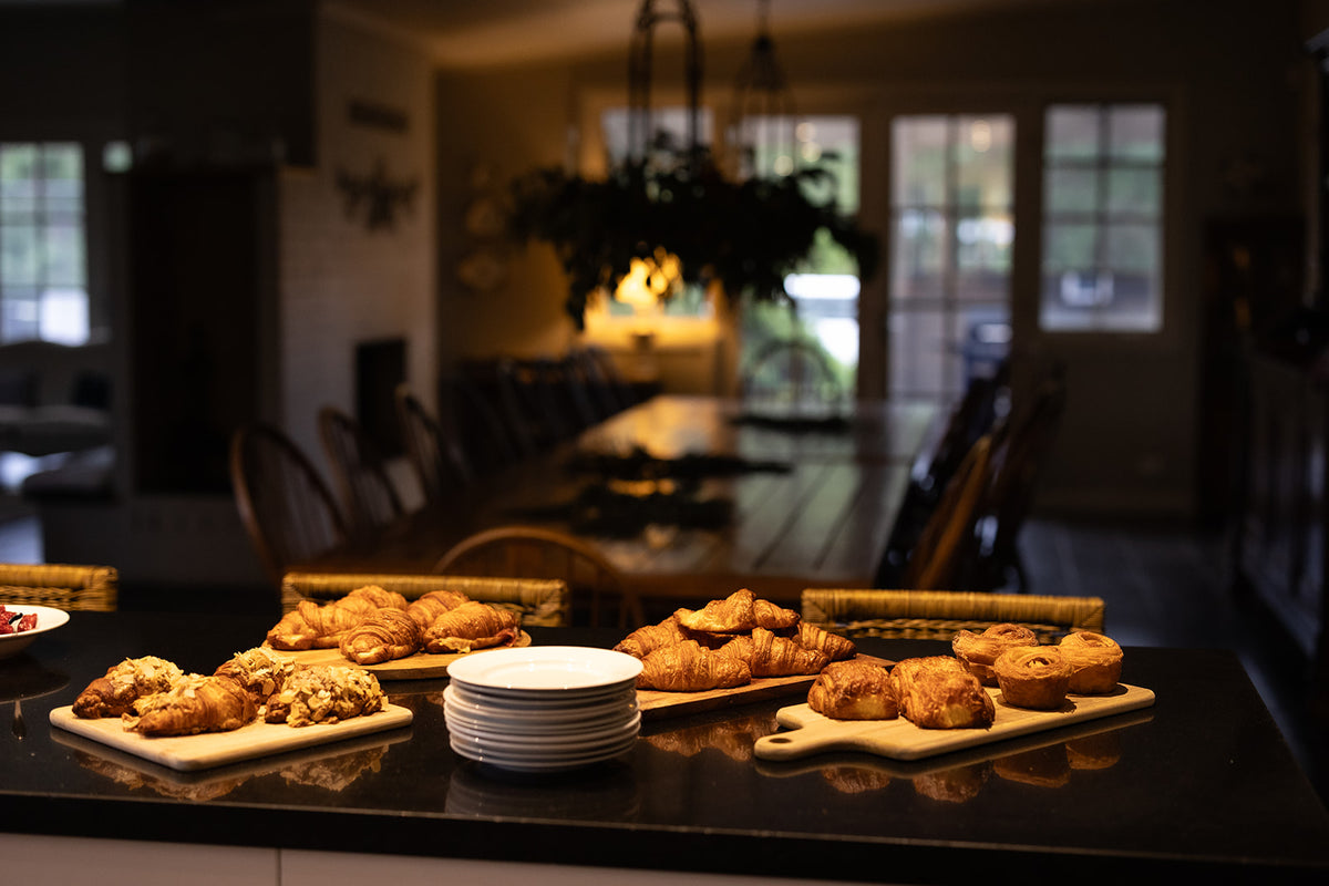 Breakfast pastries laid out beside the dining table at Lake David